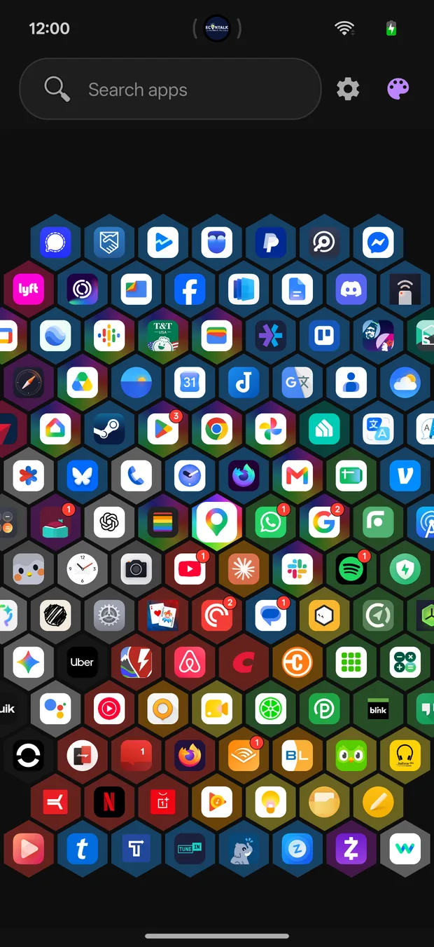 The Honeycomb view: a dense hex spiral of app icons on colored cells.
