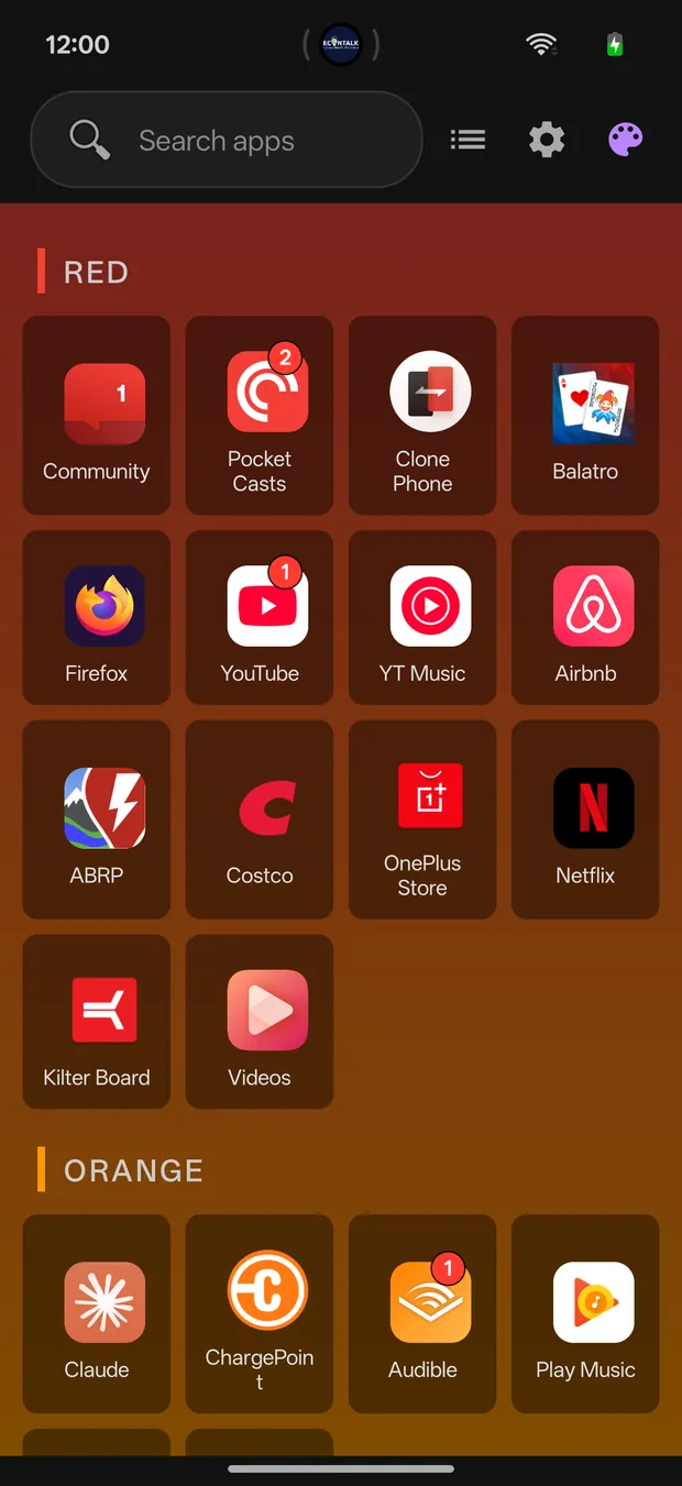 The Rainbow view: apps in a grid under a RED section header, the background shading from red to orange.